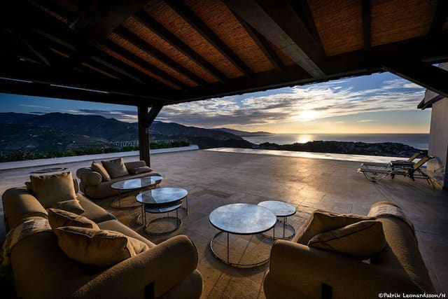 El Cortijo's covered terrace at sunset.